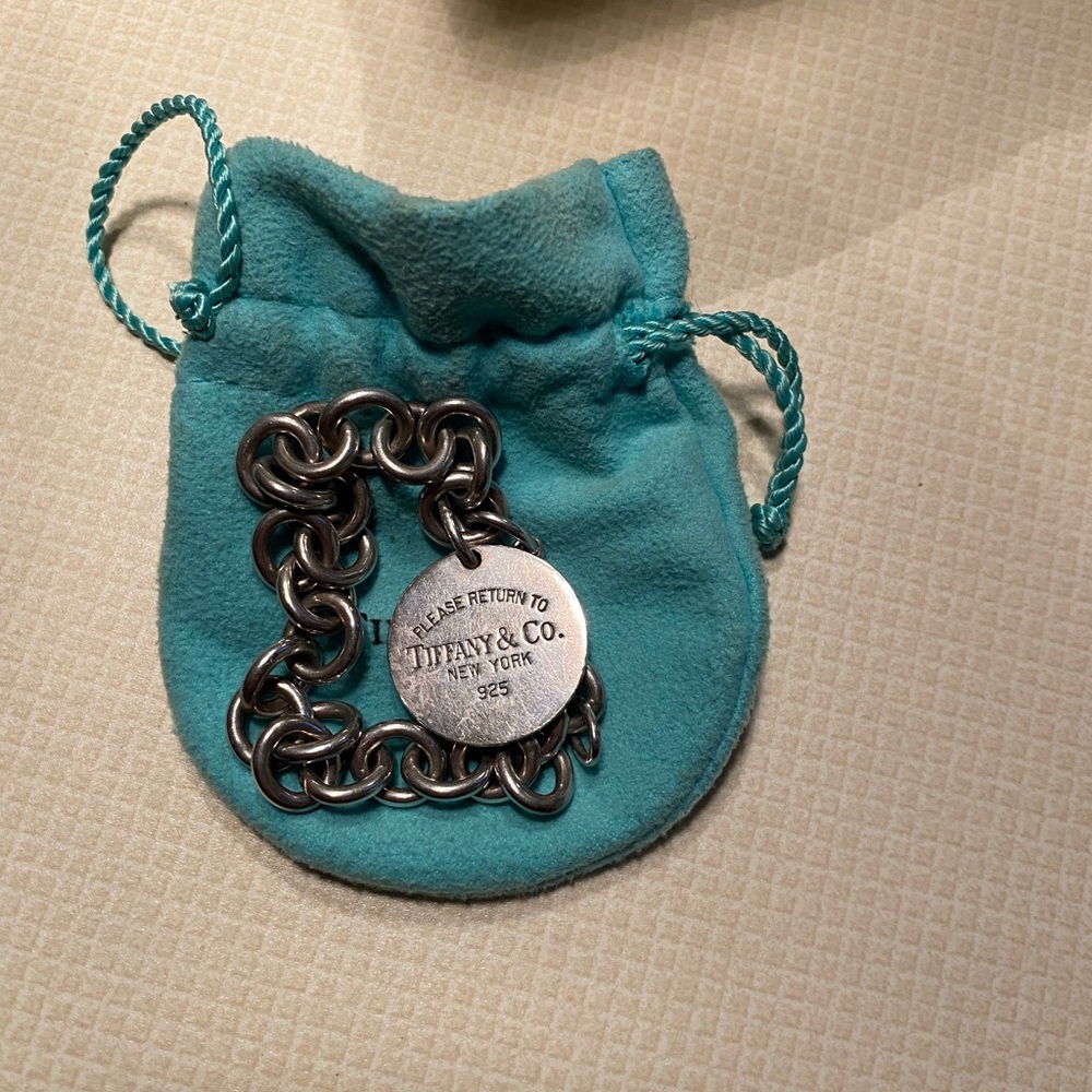 - Tiffany charm bracelet